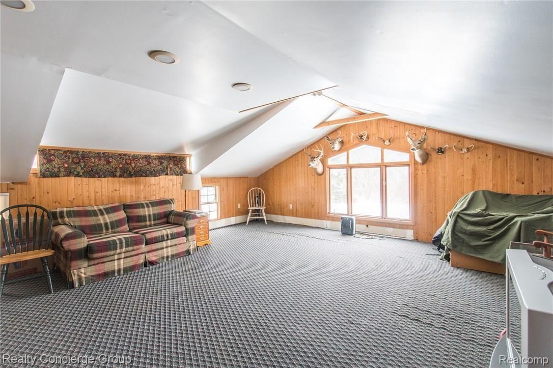 3345 South Latson Road Howell, MI 48843 - Photo 29 of 38 Media Room above the garage!