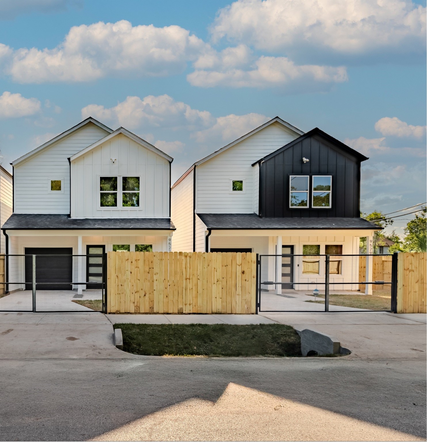 a front view of a house with garage