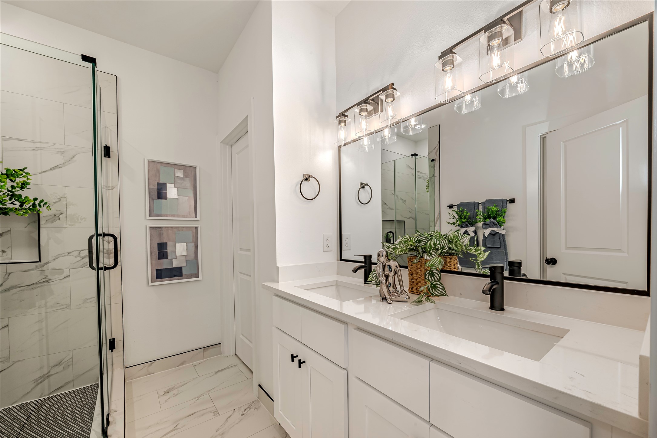 9527-9529 Beckley Street Houston, TX 77088 - Photo 12 of 14 a bathroom with a sink and mirror