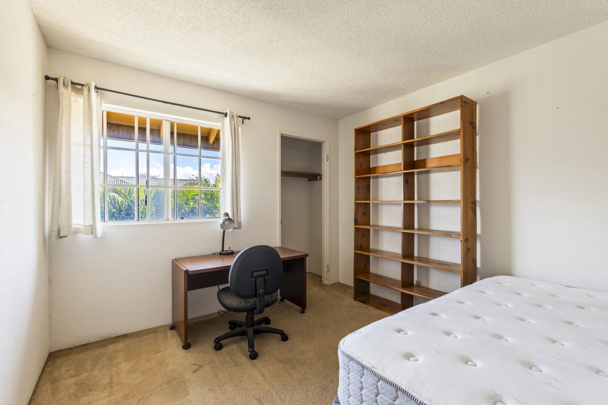 140 Uwapo Road, Unit 18203 Kihei, HI 96753 - Photo 22 of 40 a view of a workspace with furniture and a window