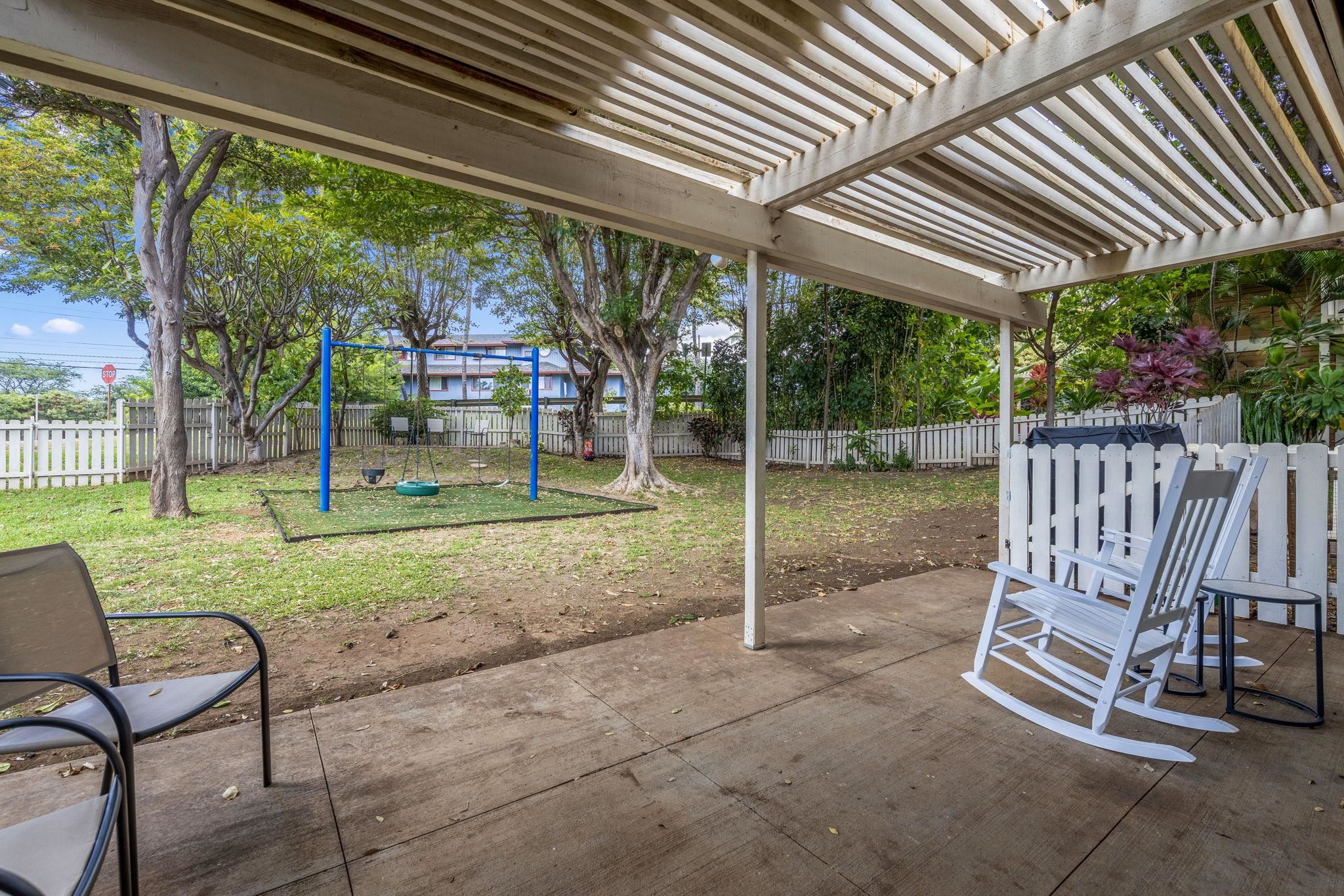 140 Uwapo Road, Unit 18203 Kihei, HI 96753 - Photo 37 of 40 a view of a backyard with sitting area and furniture