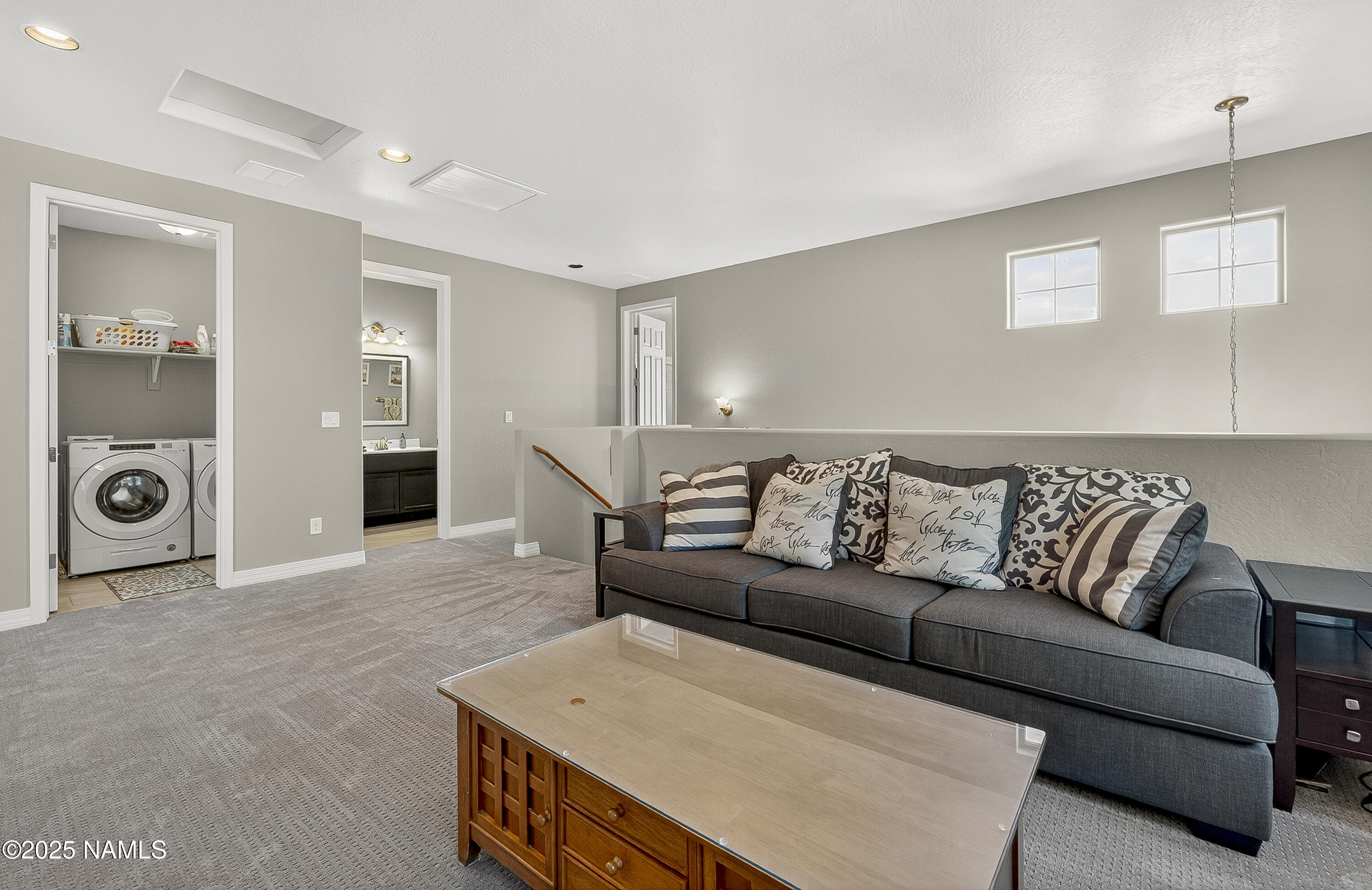 3143 East Cold Springs Trail Flagstaff, AZ 86004 - Photo 19 of 33 a living room with furniture and a table