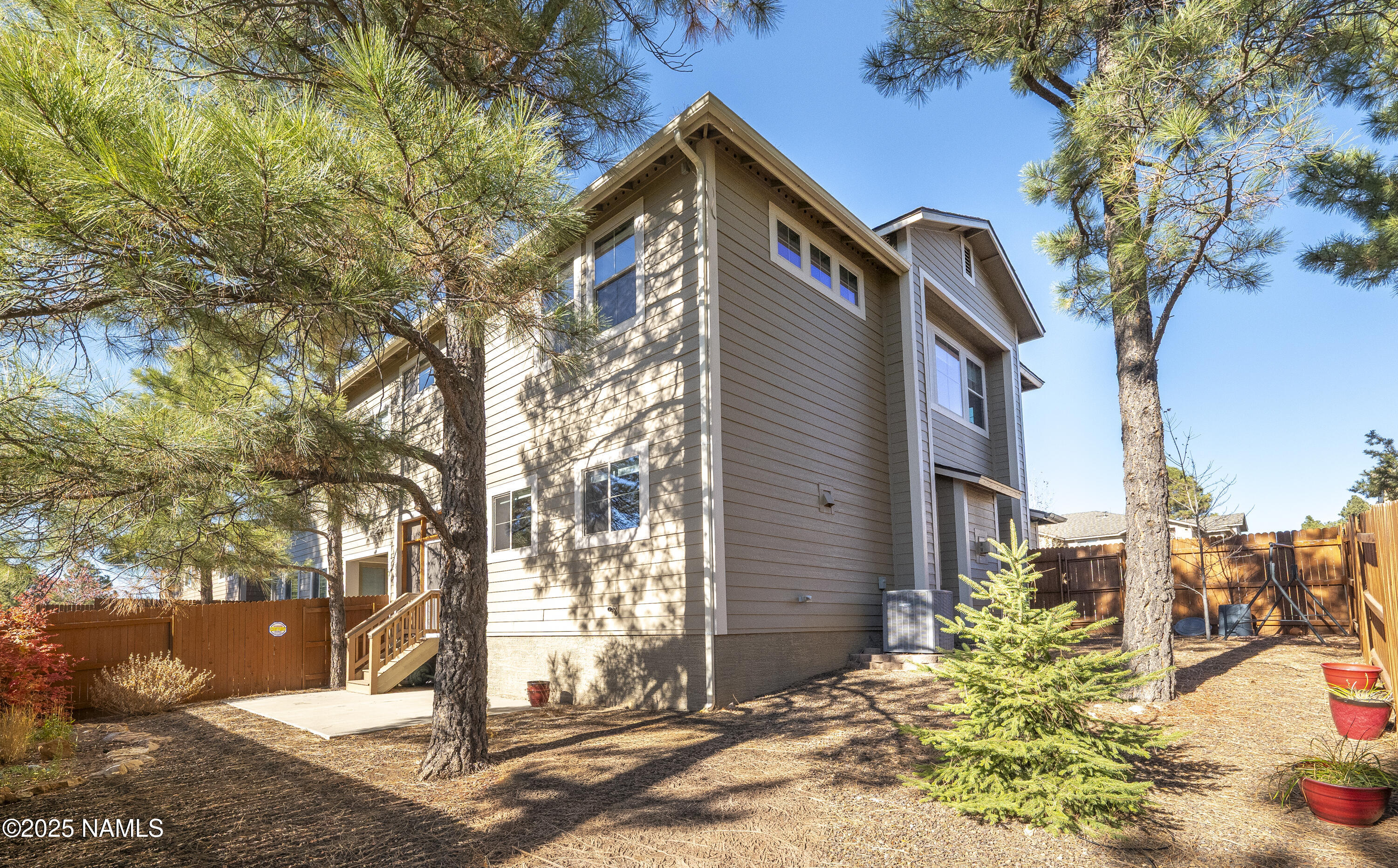 3143 East Cold Springs Trail Flagstaff, AZ 86004 - Photo 27 of 33 a front view of a house with a yard