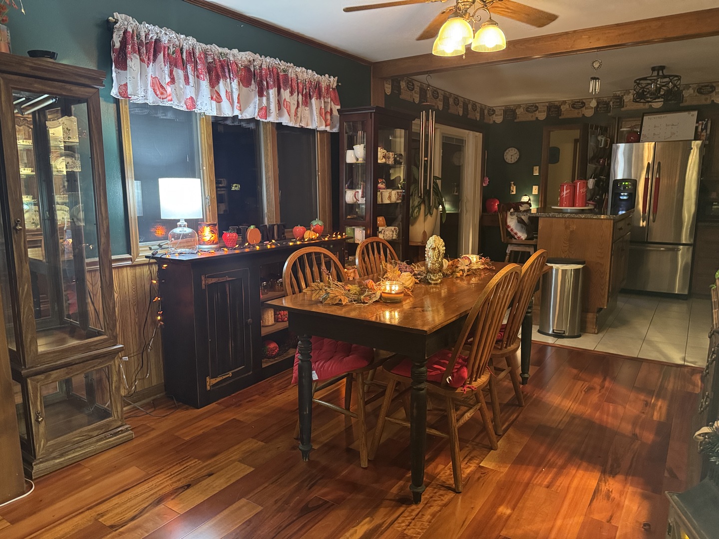 21 Colonial Drive Clinton, IL 61727 - Photo 16 of 40 a view of a dining room with furniture and chandelier