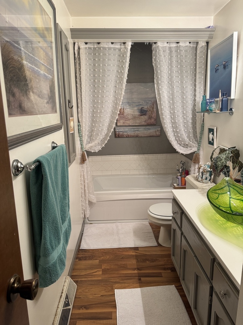 21 Colonial Drive Clinton, IL 61727 - Photo 25 of 40 a bathroom with a sink and a mirror