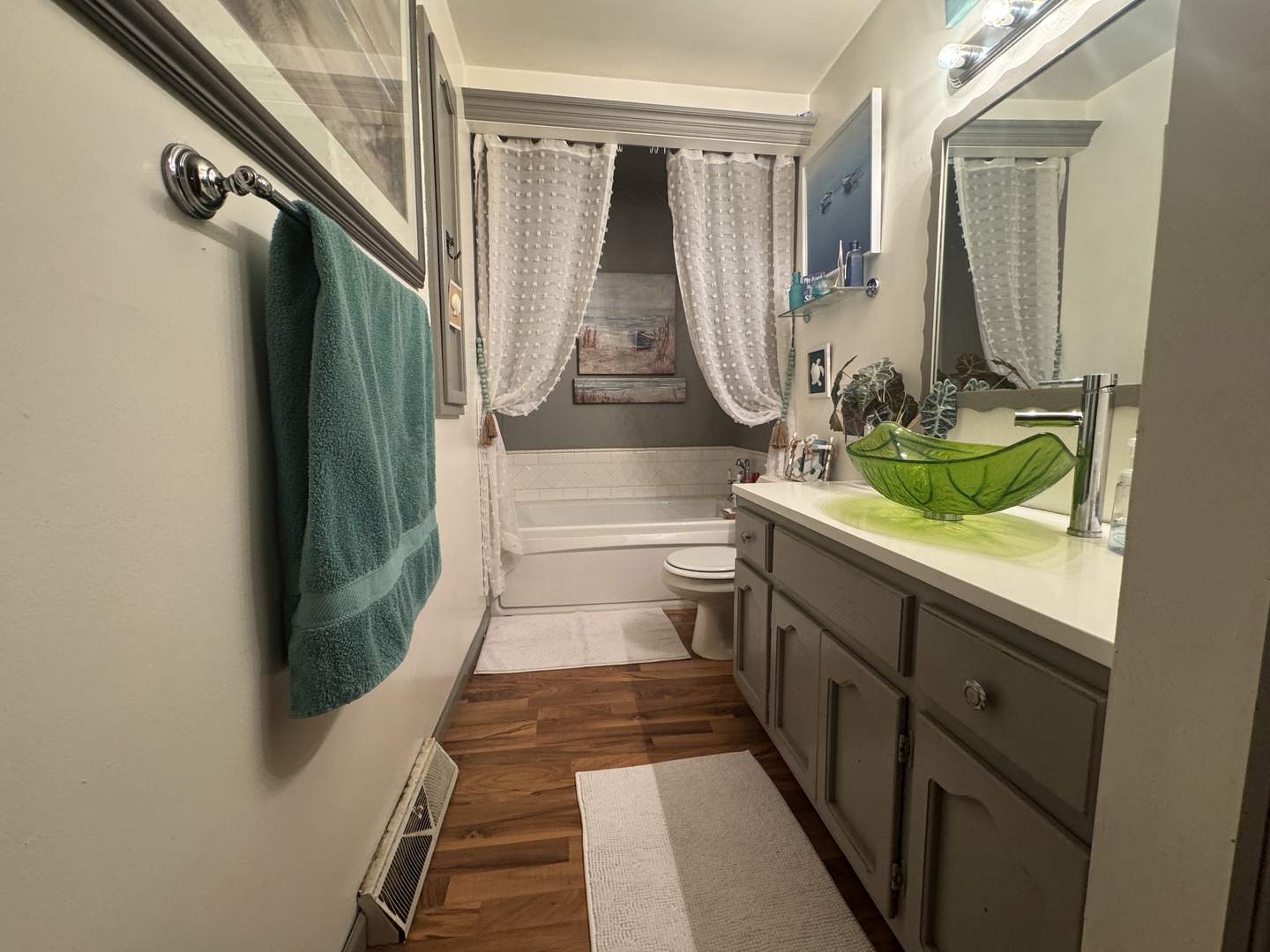 21 Colonial Drive Clinton, IL 61727 - Photo 26 of 40 a bathroom with a sink and mirror