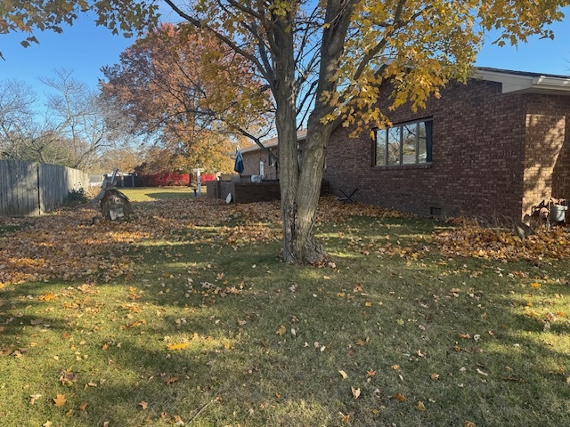 21 Colonial Drive Clinton, IL 61727 - Photo 5 of 40 a view of a yard with plants