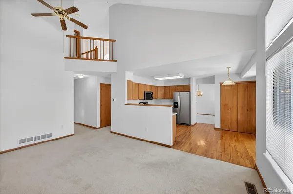 a view of empty room with fireplace