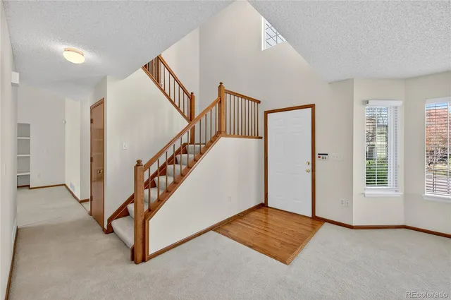 a view of an entryway with staircase