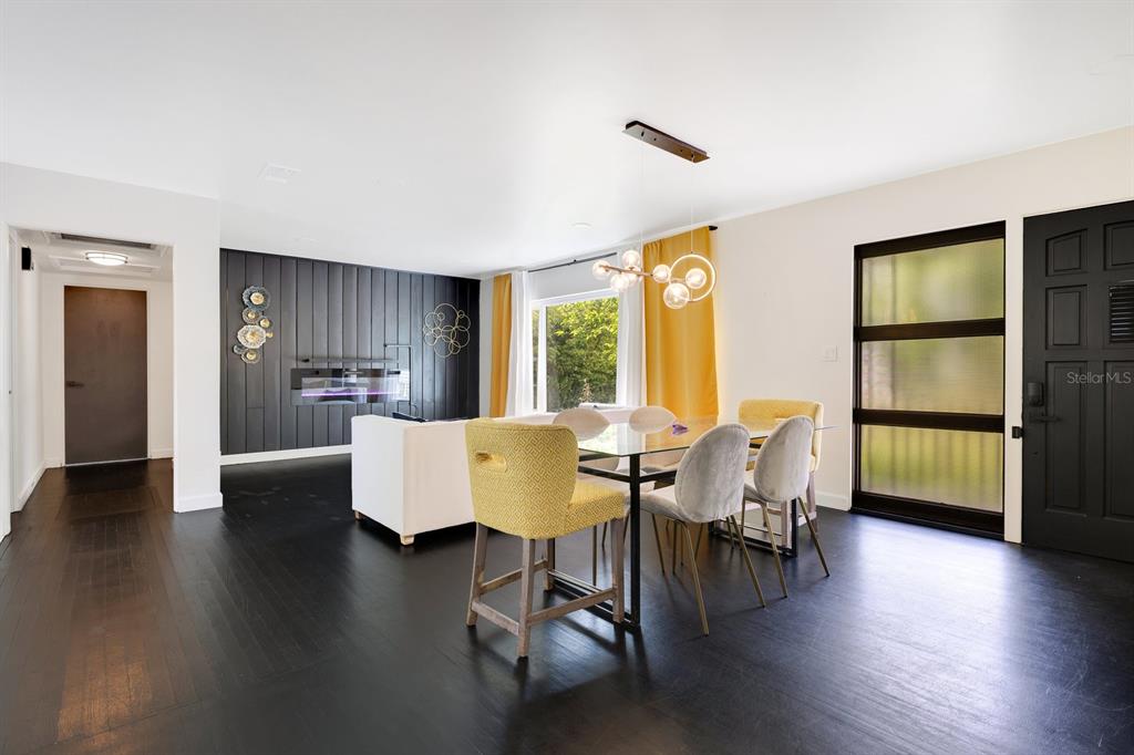 344 Starling Road Winter Park, FL 32789 - Photo 4 of 43 a living room with furniture wooden floor and a table