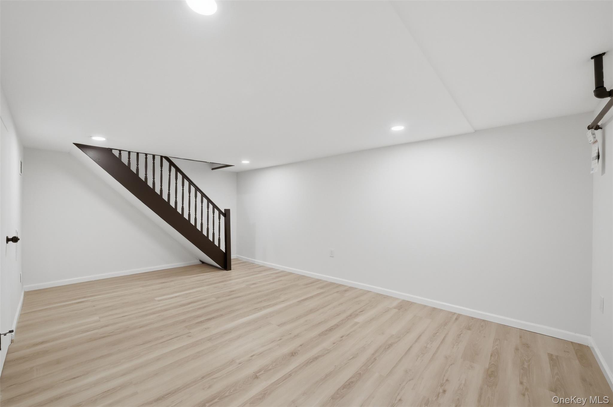 24 Fuller Road Ossining, NY 10562 - Photo 33 of 48 a view of an empty room with stairs