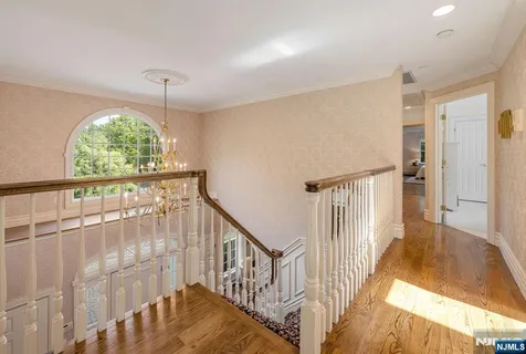 a view of an entryway with a floor to ceiling window