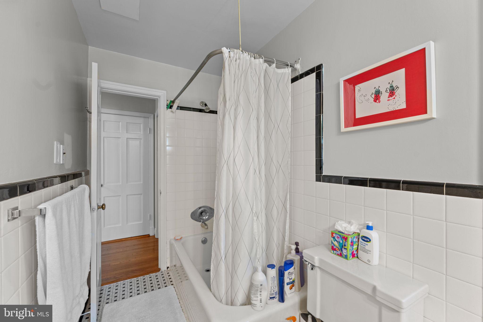 5121 Baltan Road Bethesda, MD 20816 - Photo 56 of 90 Charming bathroom with modern touches.