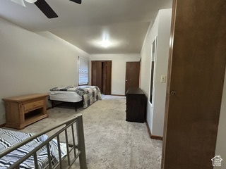 481 East Center Street Logan, UT 84321 - Photo 13 of 23 Carpeted flooring throughout, white painted walls, and a ceiling fan with integrated lighting