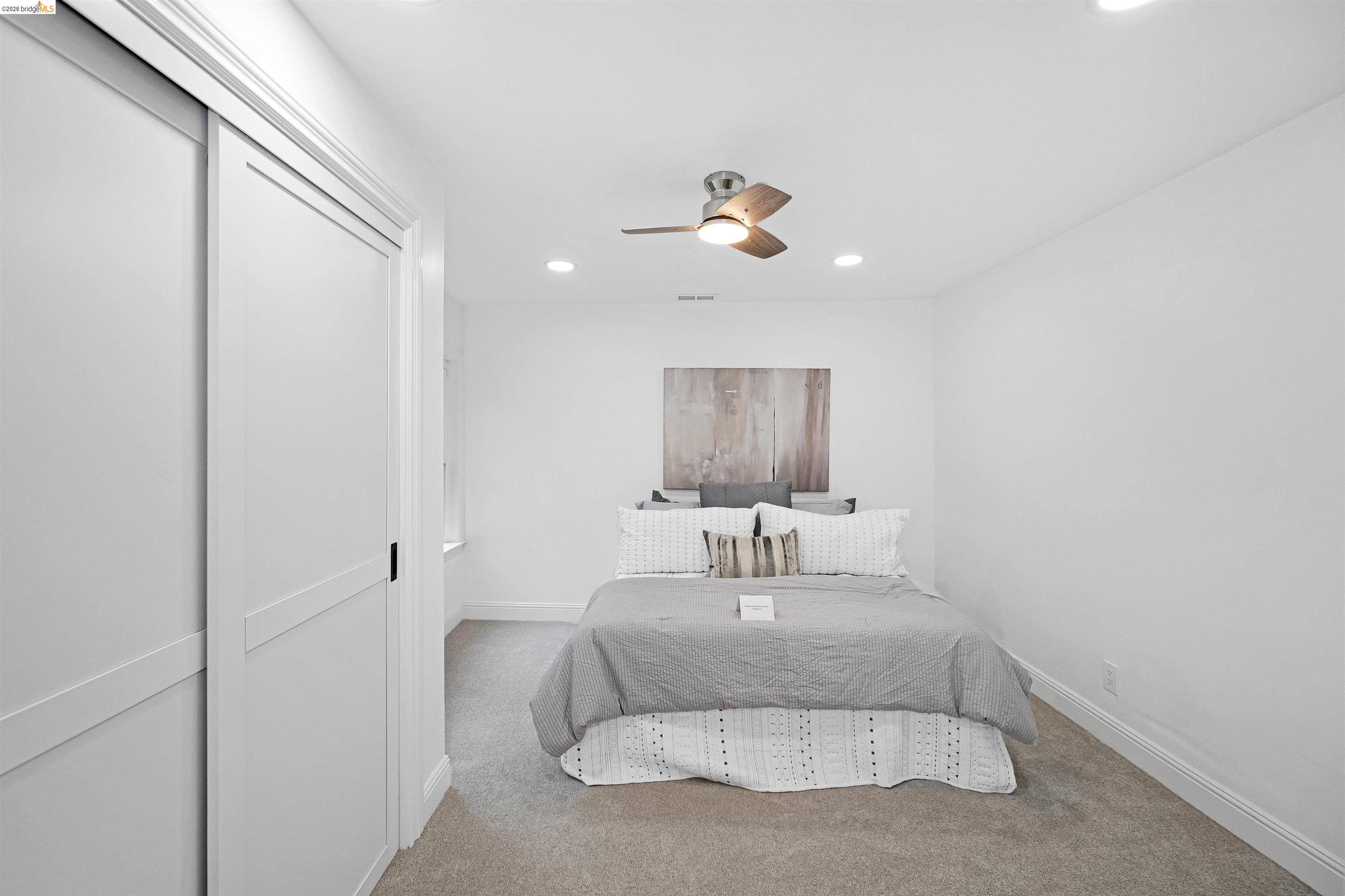 1812 Woolsey Street Berkeley, CA 94703 - Photo 18 of 48 Bright room featuring recessed lighting and a ceiling fan with integrated lighting