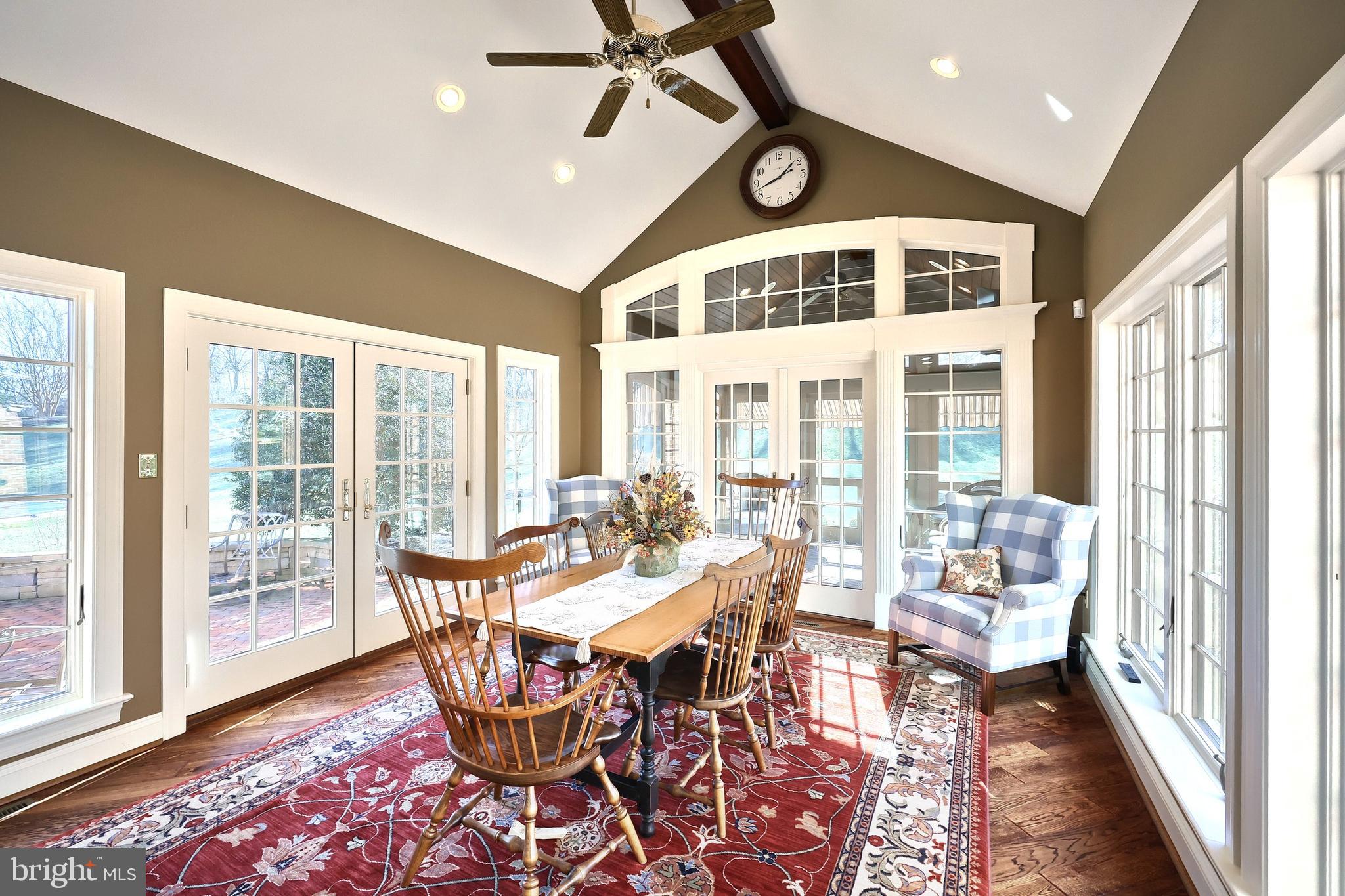 245 Orchard Drive Hanover, PA 17331 - Photo 21 of 78 a dining room with furniture water view and a floor to ceiling window