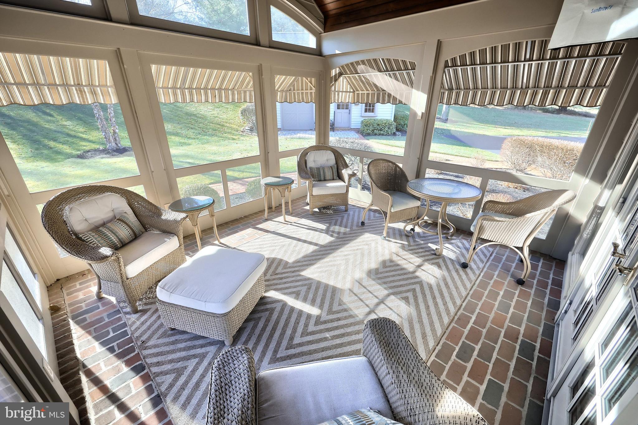 245 Orchard Drive Hanover, PA 17331 - Photo 26 of 78 a living room with furniture and a floor to ceiling window