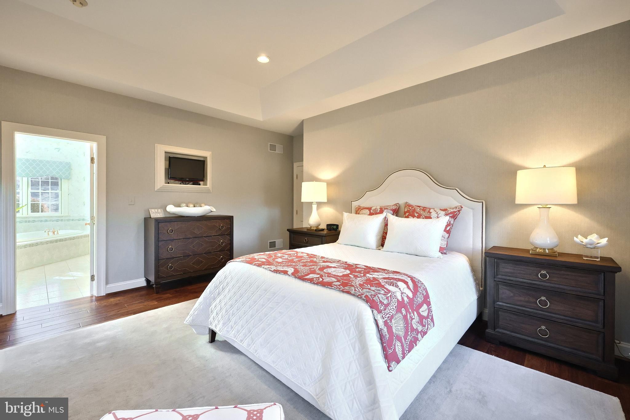 245 Orchard Drive Hanover, PA 17331 - Photo 30 of 78 a bedroom with a bed and a lamp on dresser