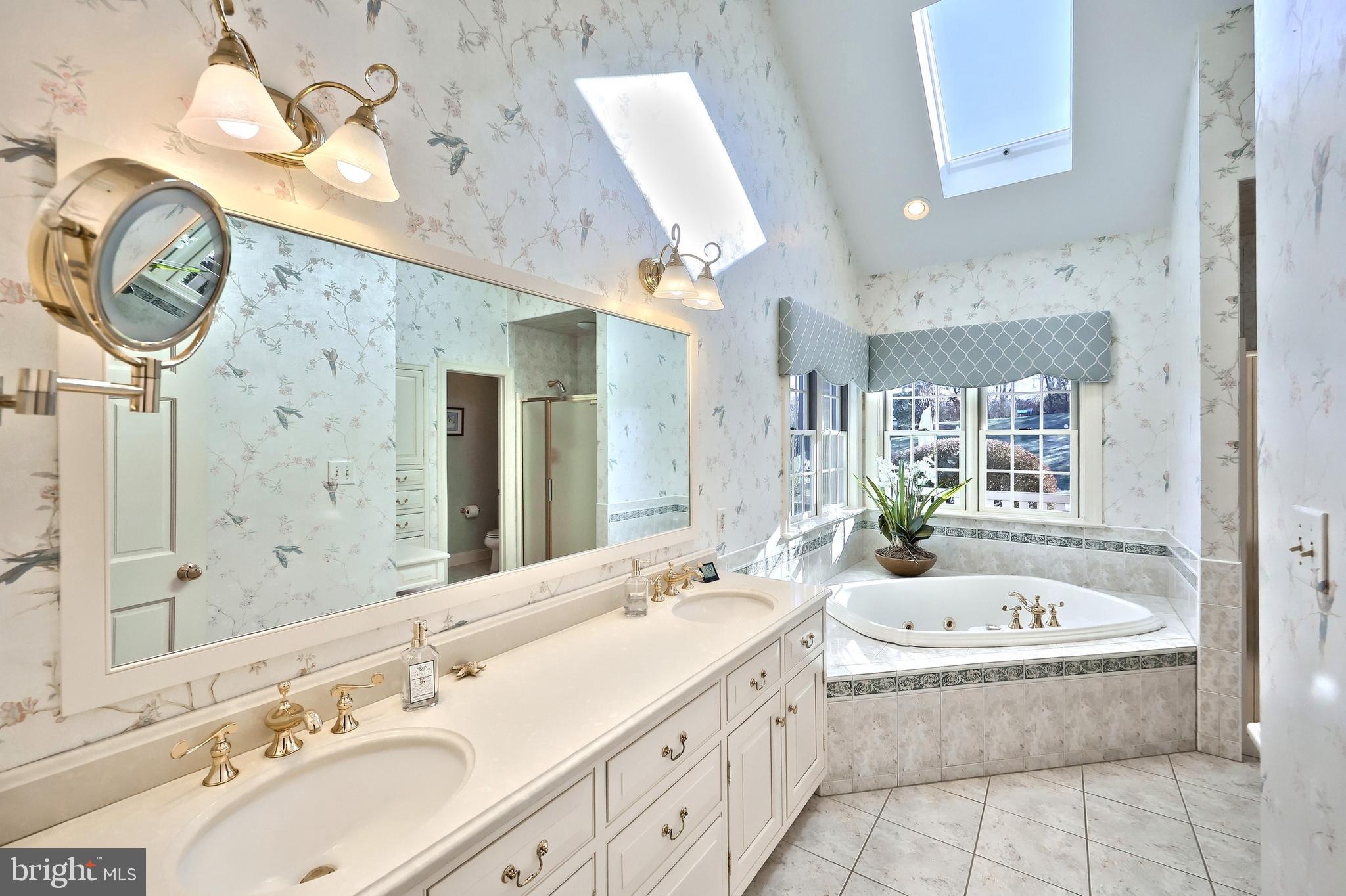 245 Orchard Drive Hanover, PA 17331 - Photo 32 of 78 a bathroom with a granite countertop tub sink and mirror