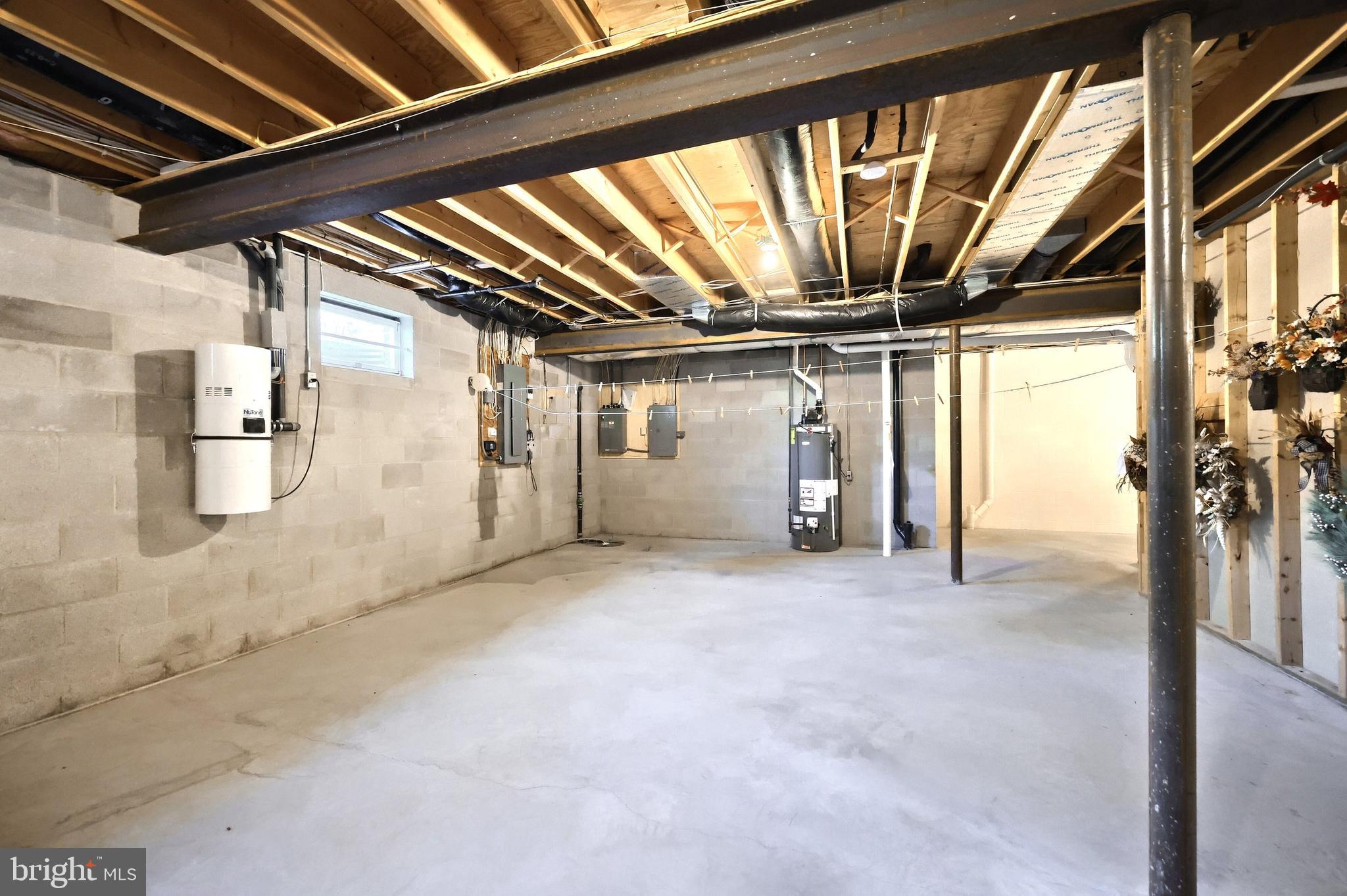 245 Orchard Drive Hanover, PA 17331 - Photo 49 of 78 Unfinished area of basement. 2 hot water heaters.