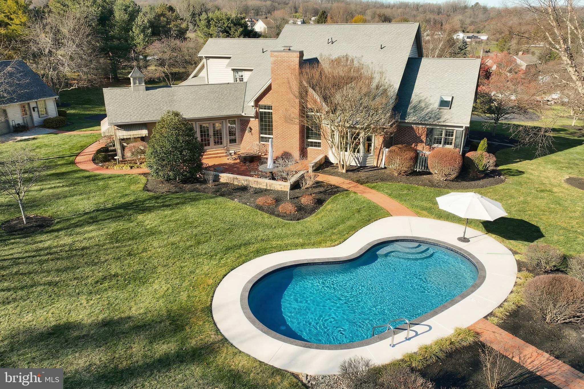 245 Orchard Drive Hanover, PA 17331 - Photo 52 of 78 an aerial view of a house with swimming pool and garden