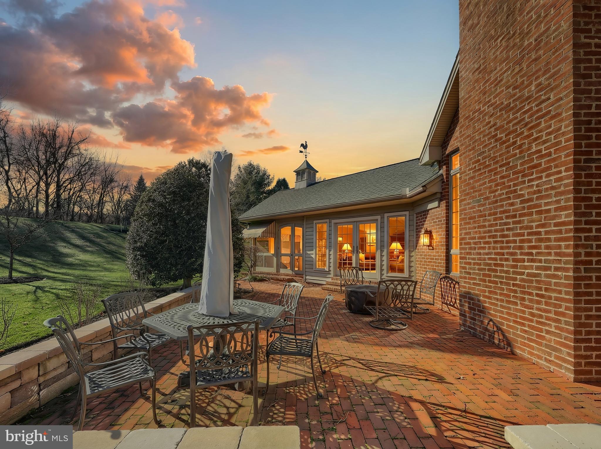 245 Orchard Drive Hanover, PA 17331 - Photo 55 of 78 a view of a patio with table and chairs with wooden floor and fence