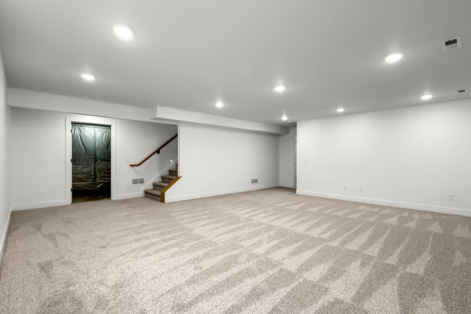 606 Kevin Road Blue Grass, IA 52726 - Photo 11 of 33 an empty room with windows
