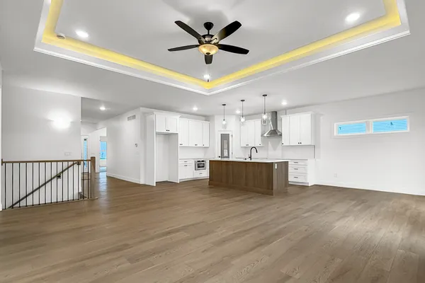 a view of kitchen with wooden floor and window