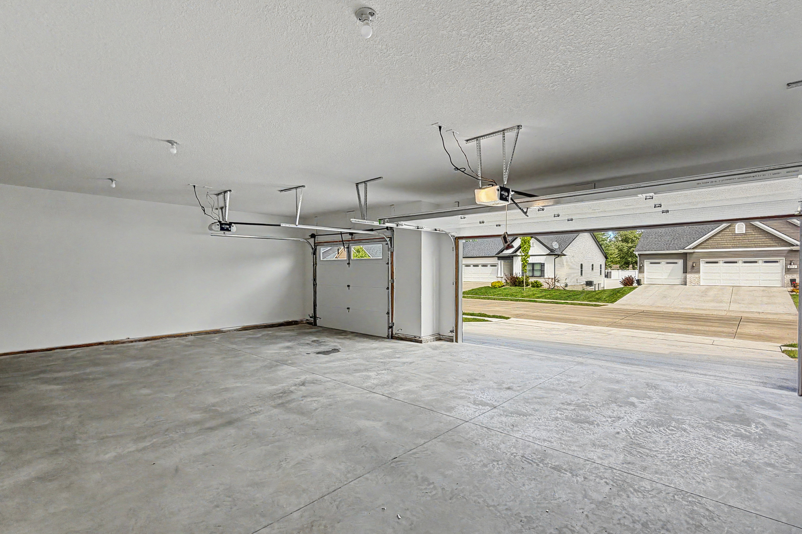 606 Kevin Road Blue Grass, IA 52726 - Photo 7 of 33 a view of a garage