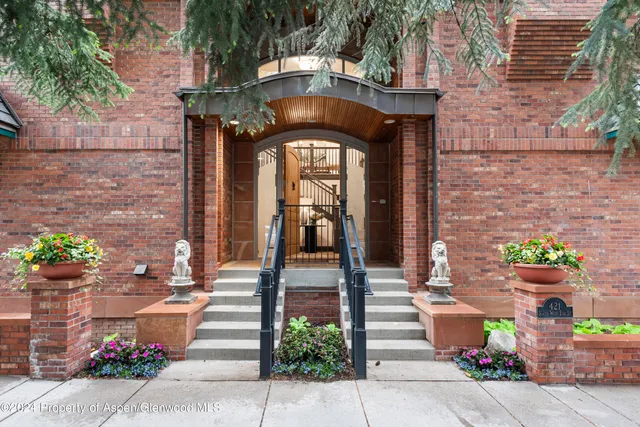 a front view of a house with outdoor space