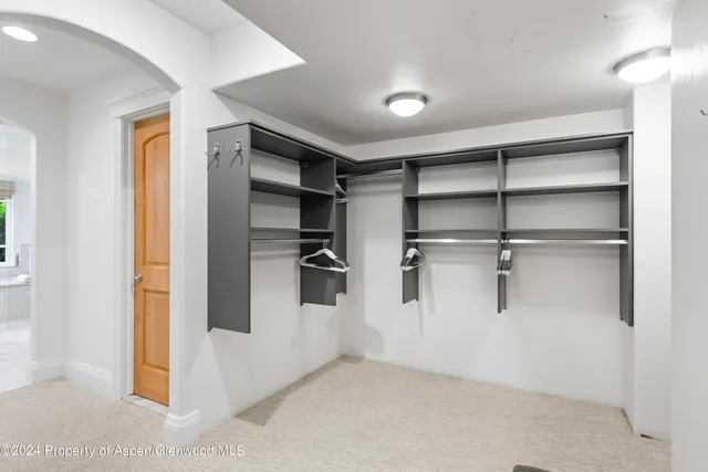 a view of a room with shelves