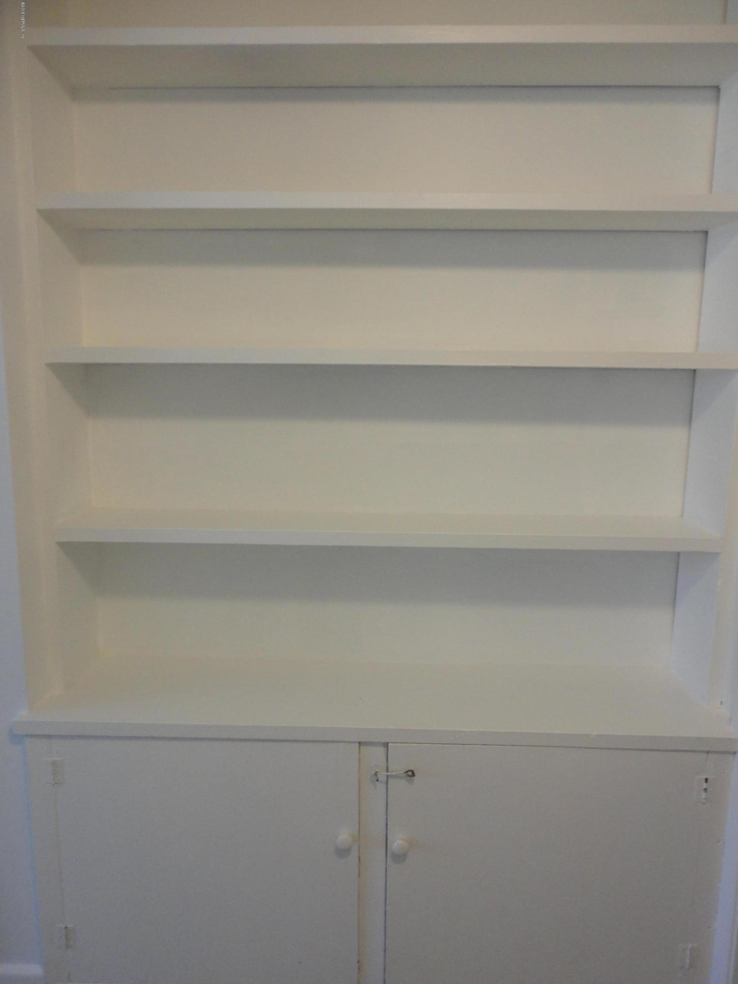 776 Acapulco Road Jacksonville, FL 32216 - Photo 11 of 22 Hallway Built-in Book Shelf