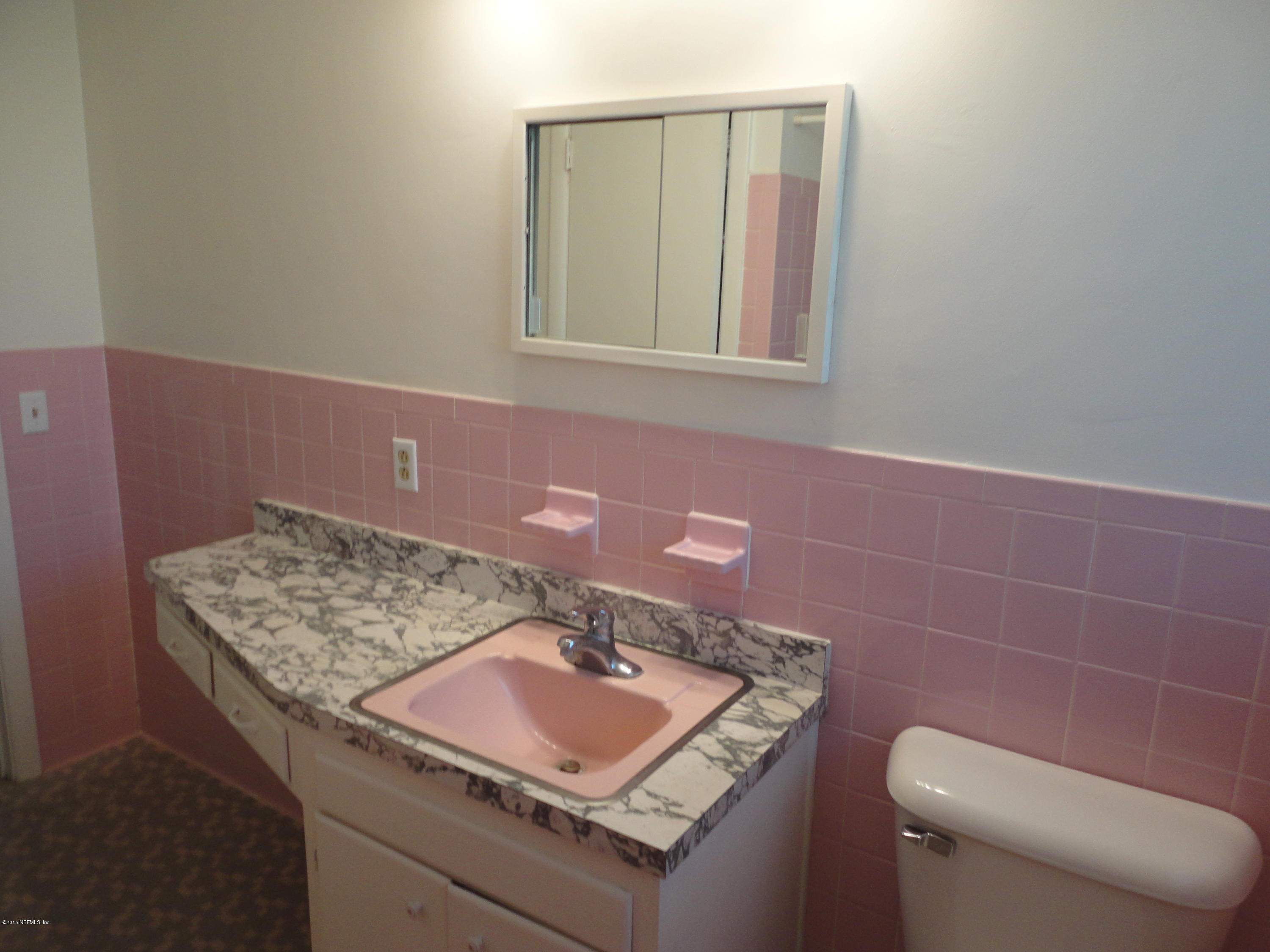 776 Acapulco Road Jacksonville, FL 32216 - Photo 14 of 22 Hallway bathroom vanity