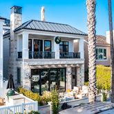 a front view of a house with swimming pool