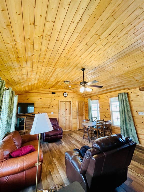 214 Cedar Creek Park Road Whitney, TX 76692 - Photo 13 of 32 a living room with furniture and a window