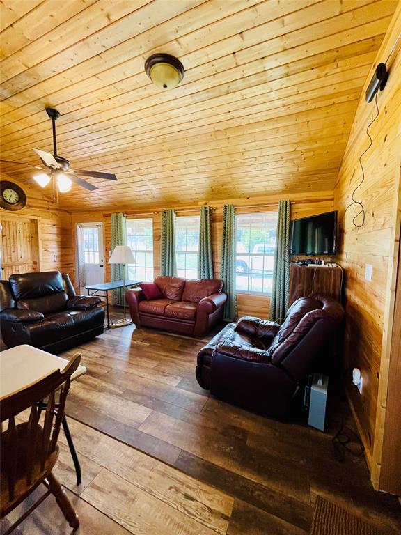 214 Cedar Creek Park Road Whitney, TX 76692 - Photo 14 of 32 a living room with furniture and a window