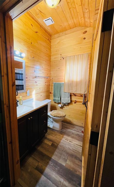 214 Cedar Creek Park Road Whitney, TX 76692 - Photo 15 of 32 a spacious bathroom with a double vanity sink and a large mirror
