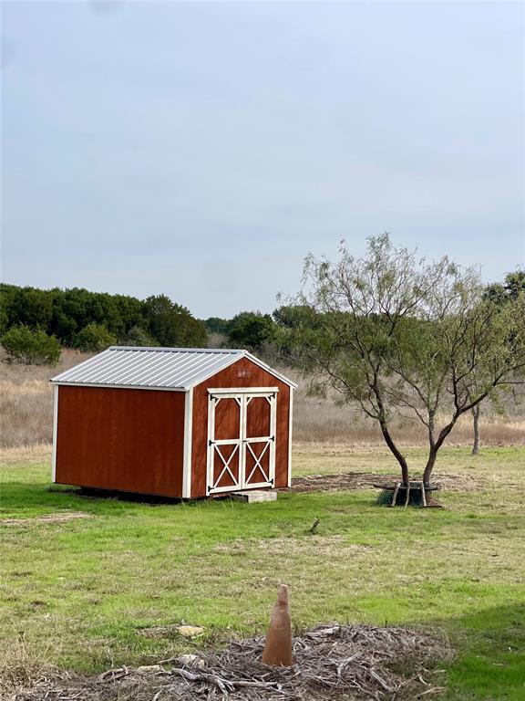 214 Cedar Creek Park Road Whitney, TX 76692 - Photo 27 of 32 a view of a back yard