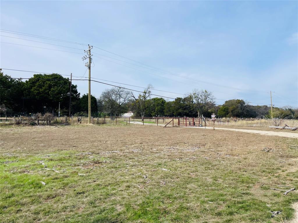 214 Cedar Creek Park Road Whitney, TX 76692 - Photo 30 of 32 a view of lake with a light