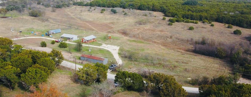 214 Cedar Creek Park Road Whitney, TX 76692 - Photo 4 of 32 a aerial view of a house with a yard