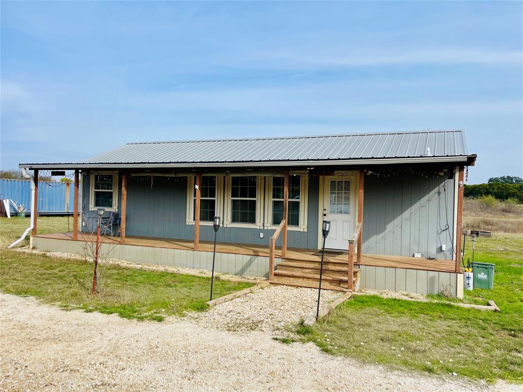 214 Cedar Creek Park Road Whitney, TX 76692 - Photo 10 of 32 front view of a house with a yard
