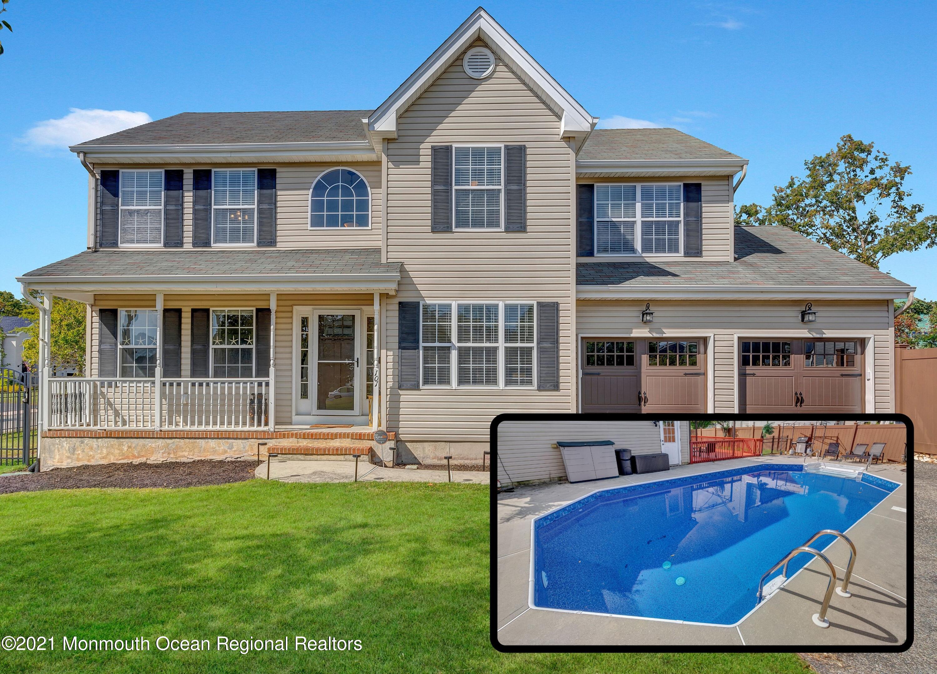 101 Longboat Road Manahawkin, NJ 08050 - Photo 1 of 47 a front view of a house with a yard table and chairs