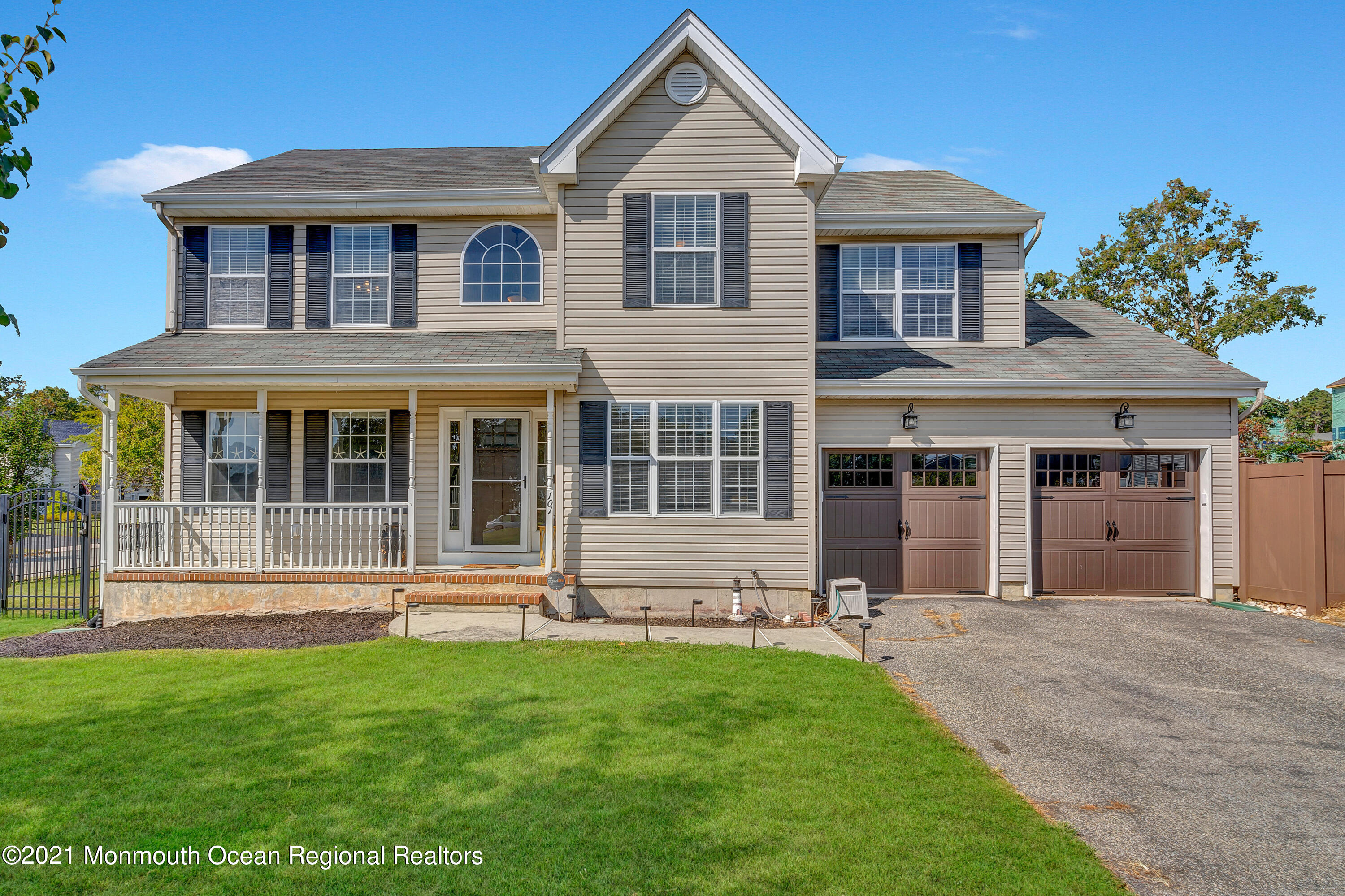 101 Longboat Road Manahawkin, NJ 08050 - Photo 2 of 47 a front view of a house with a yard