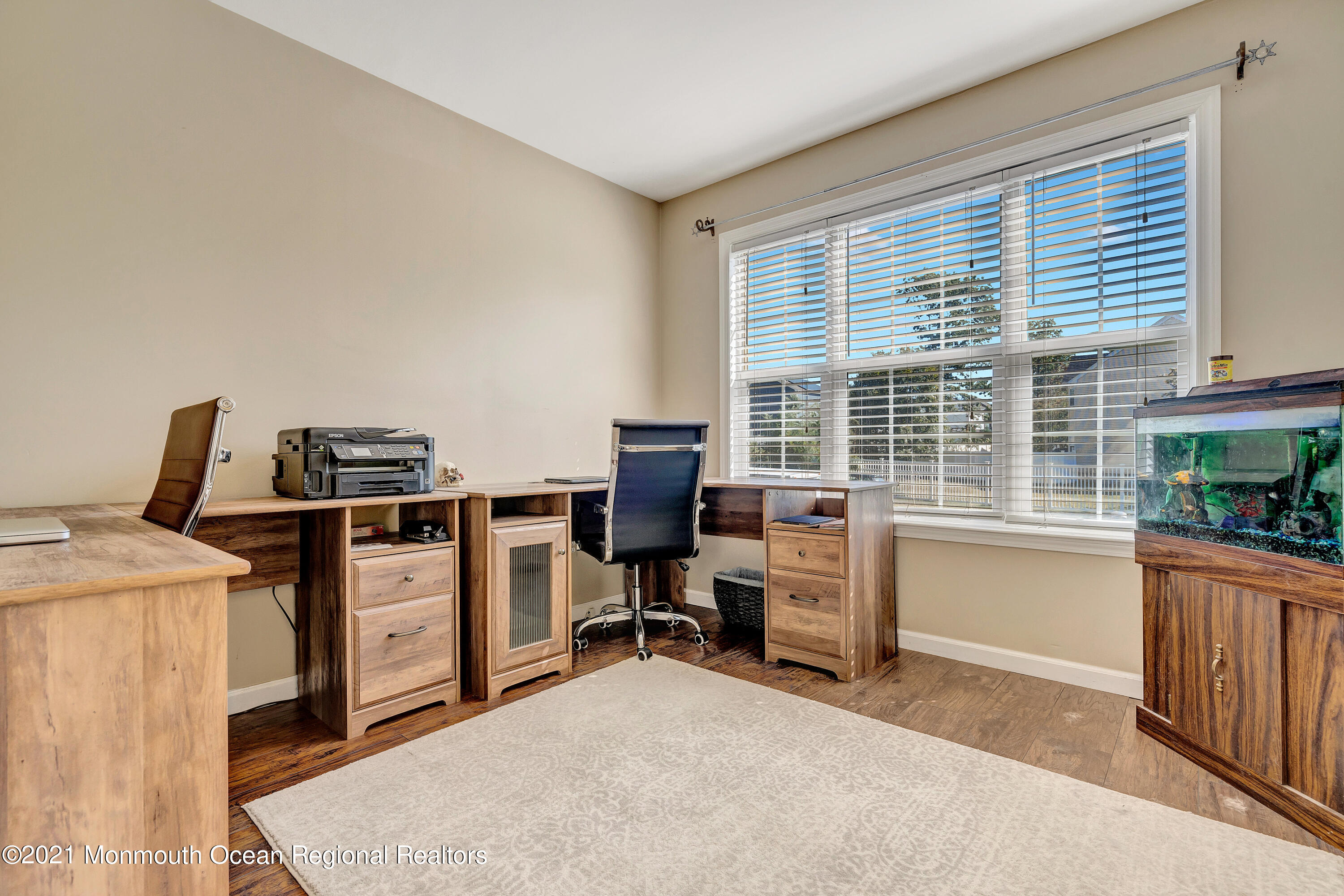 101 Longboat Road Manahawkin, NJ 08050 - Photo 11 of 47 a view of a workspace with furniture and a window