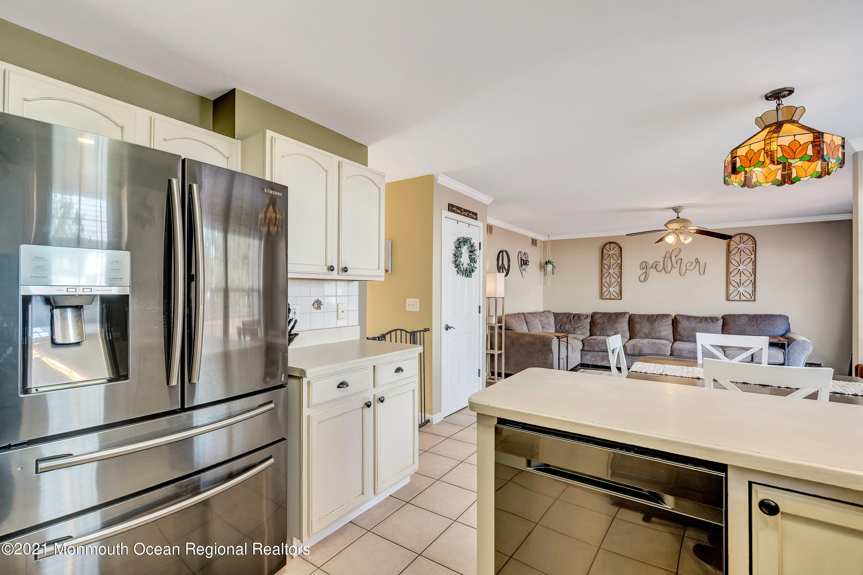 101 Longboat Road Manahawkin, NJ 08050 - Photo 22 of 47 a kitchen with stainless steel appliances a refrigerator sink and cabinets