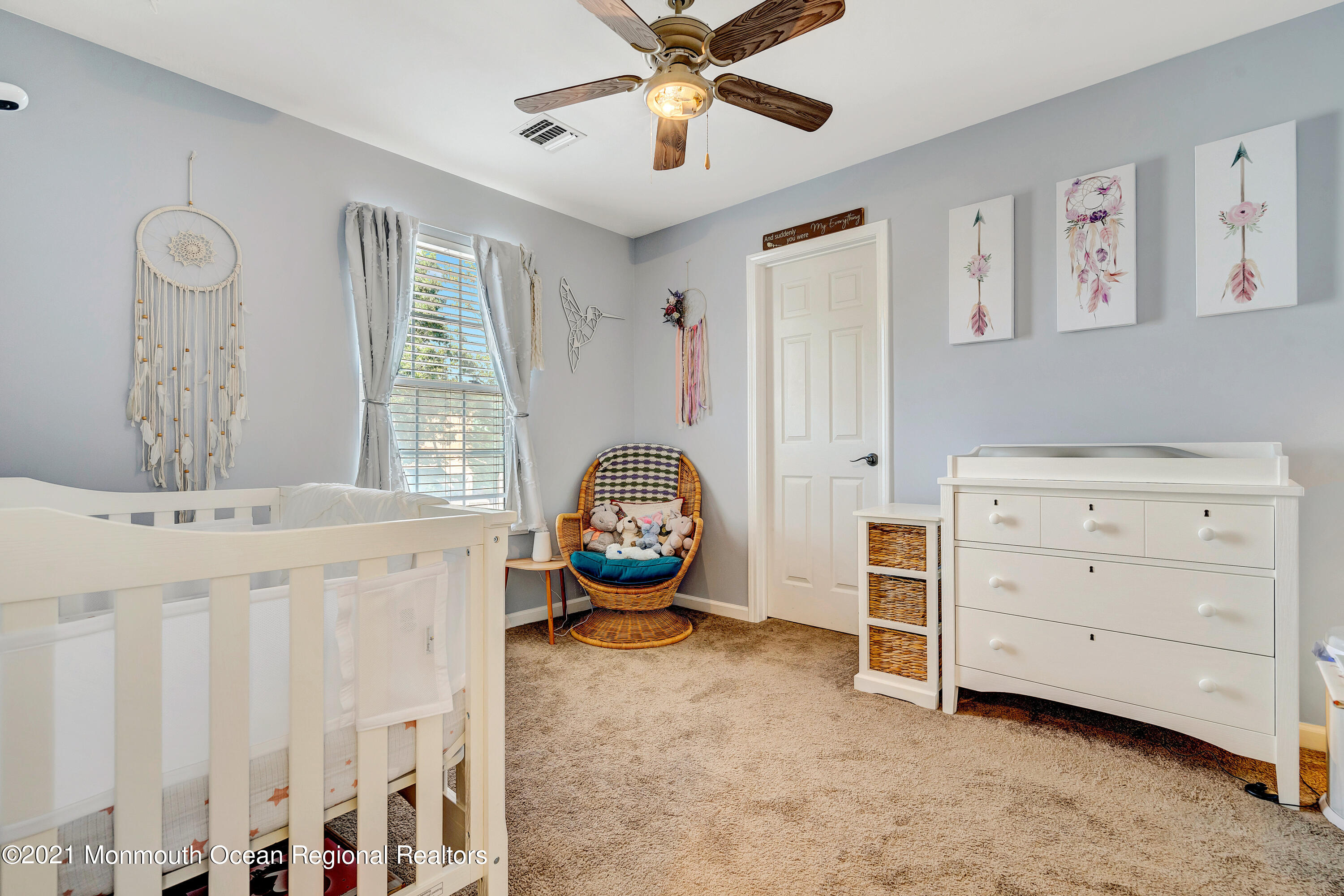 101 Longboat Road Manahawkin, NJ 08050 - Photo 30 of 47 a view of a bedroom with furniture and windows
