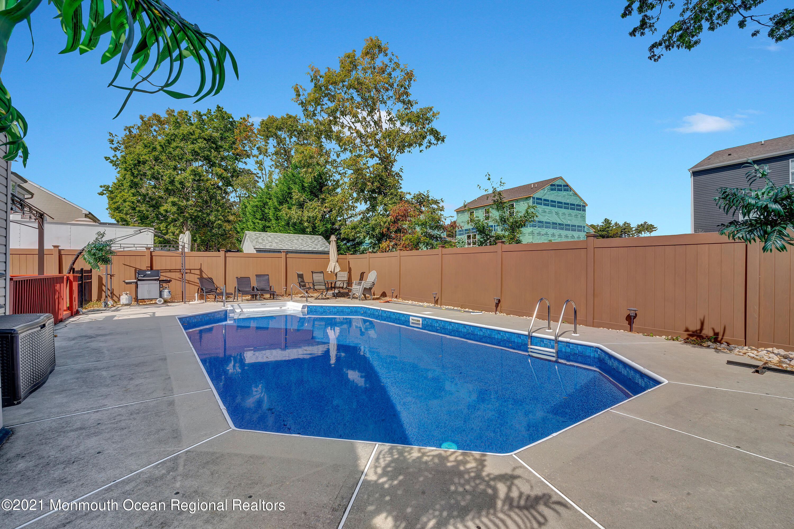 101 Longboat Road Manahawkin, NJ 08050 - Photo 37 of 47 a view of outdoor space and swimming pool