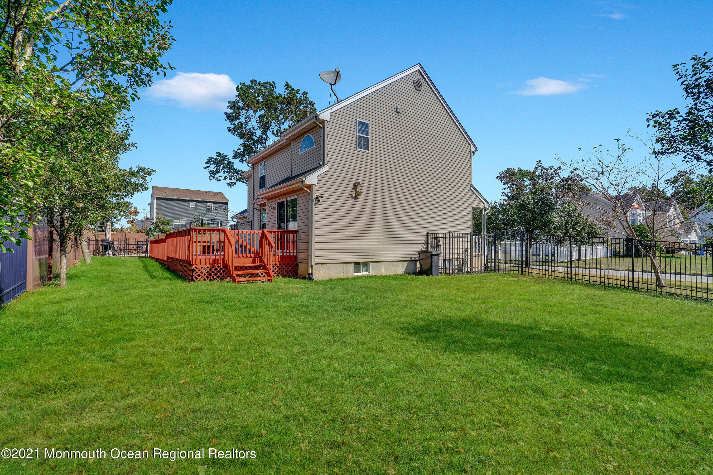 101 Longboat Road Manahawkin, NJ 08050 - Photo 41 of 47 a view of a backyard with garden