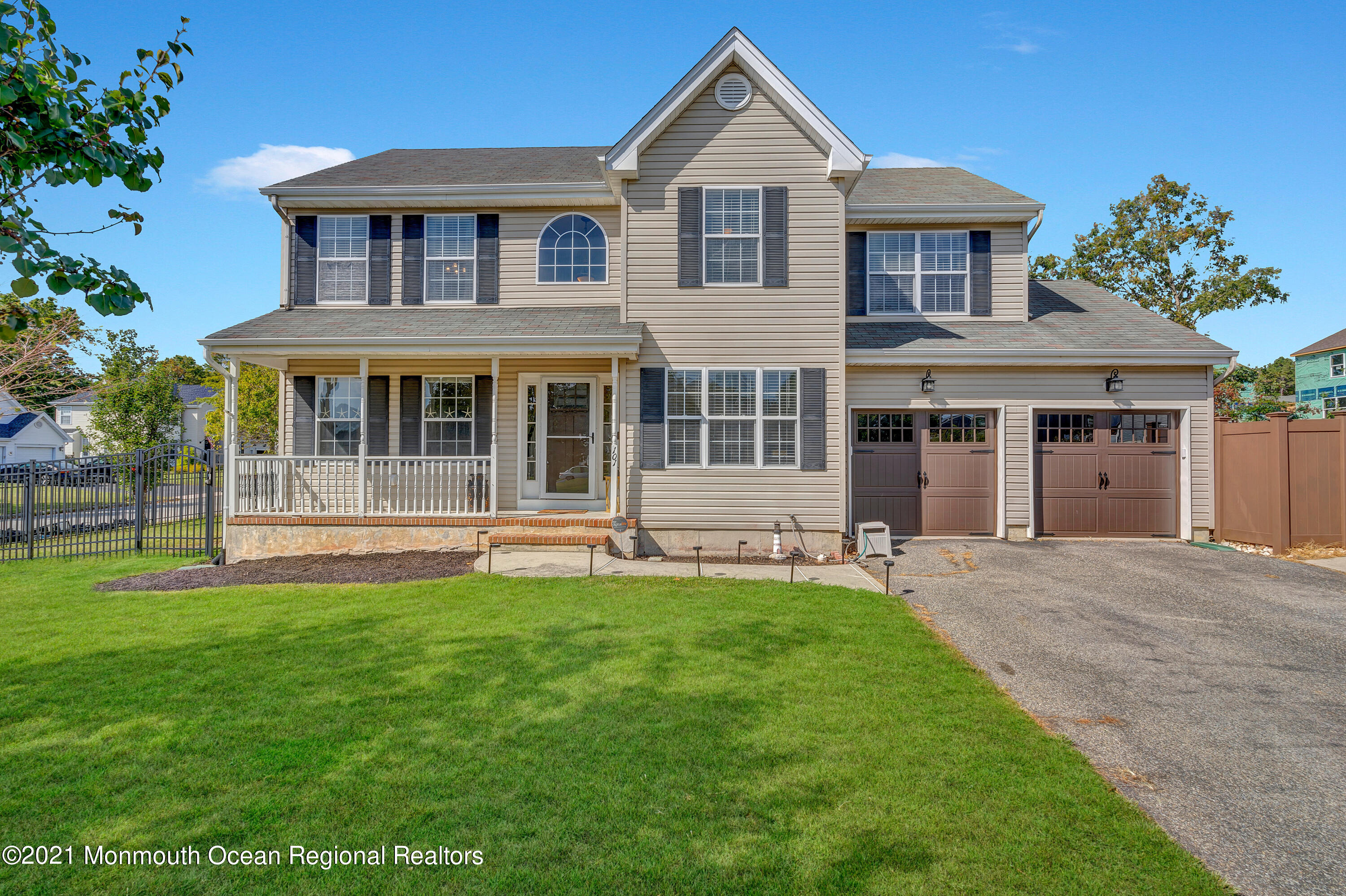 101 Longboat Road Manahawkin, NJ 08050 - Photo 44 of 47 a front view of a house with a yard