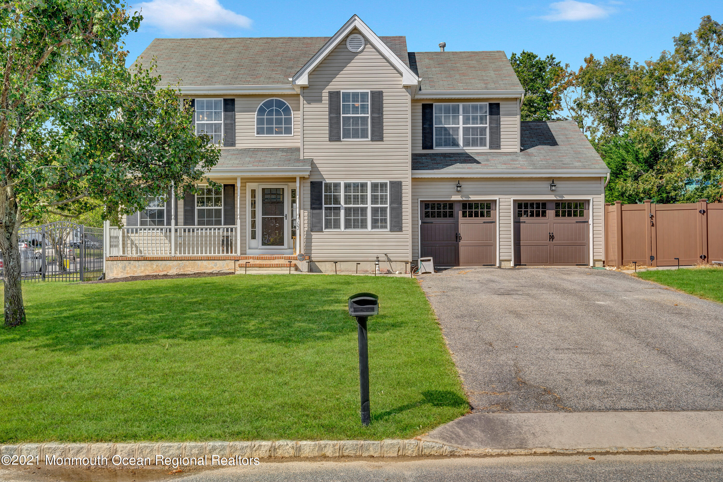 101 Longboat Road Manahawkin, NJ 08050 - Photo 45 of 47 a front view of a house with a yard